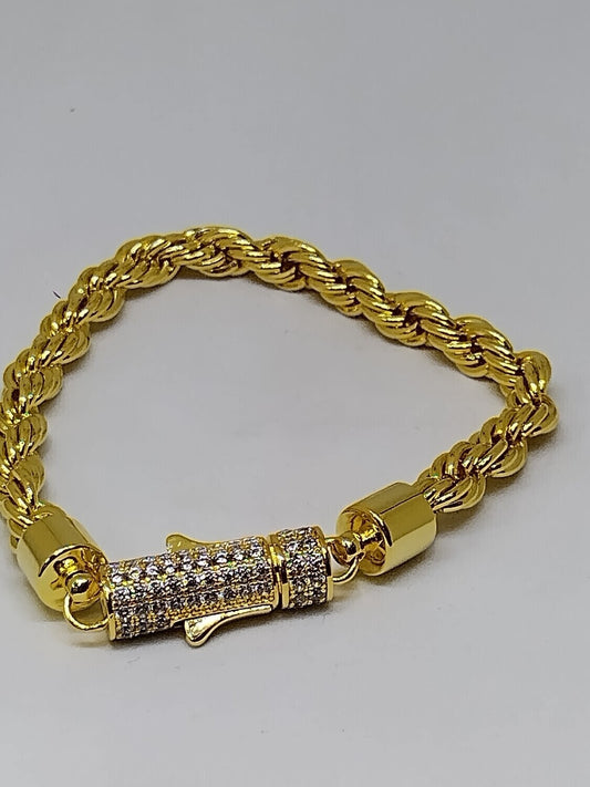 Gold bracelet with silver stone