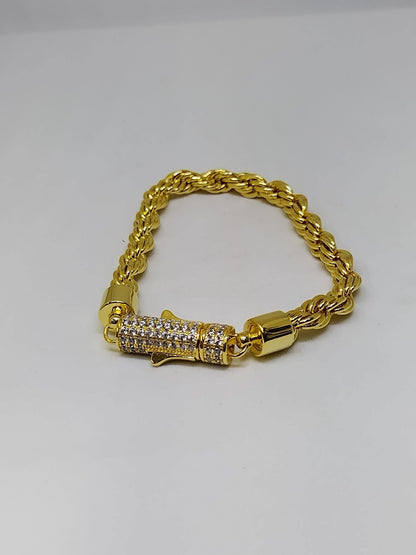 Gold bracelet with silver stone
