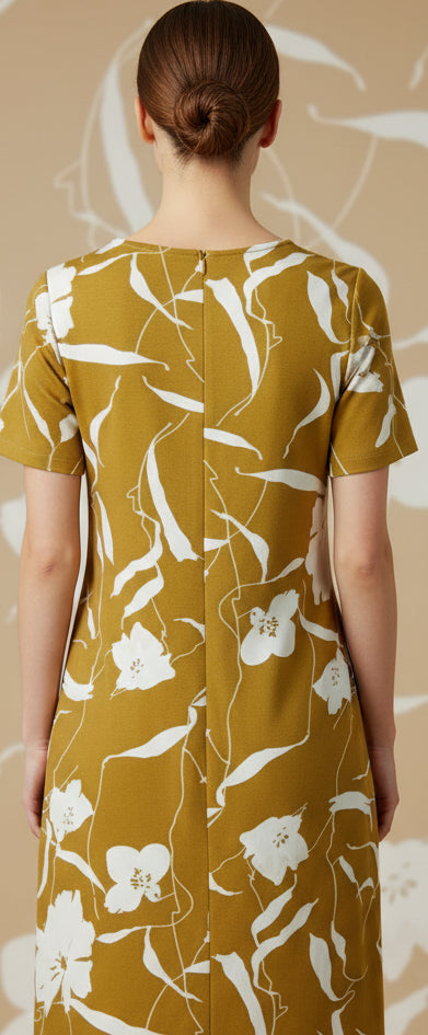 White dress with mustard yellow accents